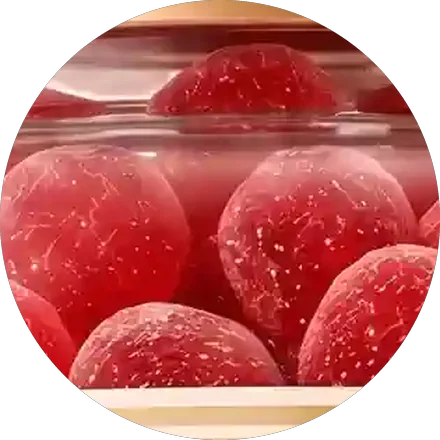 Close view of the red Gelagen gummies inside the bottle